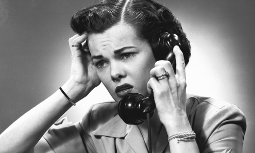 Displeased woman on phone